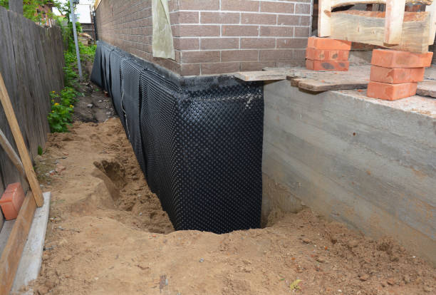 Happy homeowners after waterproofing job in Lewis Center